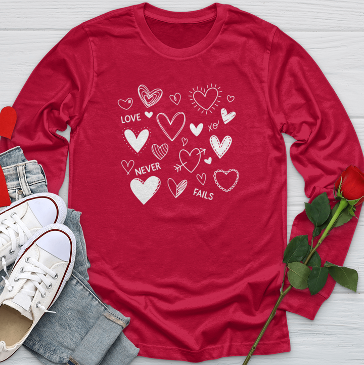 Love Never Fails Candy Hearts Softstyle Long Sleeve