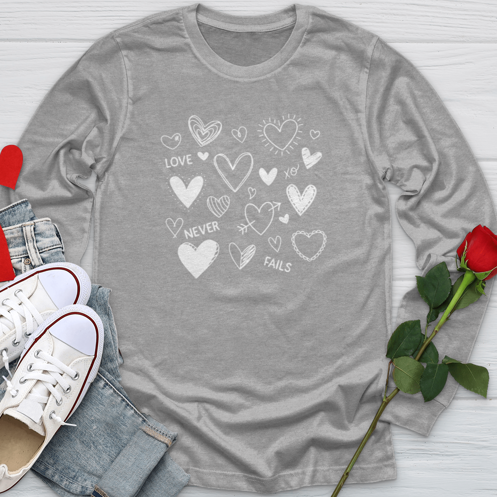 Love Never Fails Candy Hearts Softstyle Long Sleeve