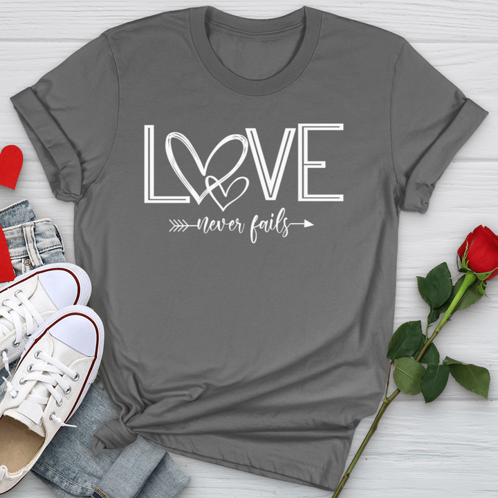 Love Never Fails Heart Arrow Softstyle Tee