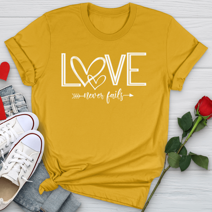 Love Never Fails Heart Arrow Softstyle Tee