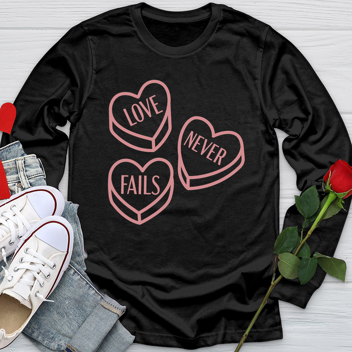 Love Never Fails Candy Softstyle Long Sleeve