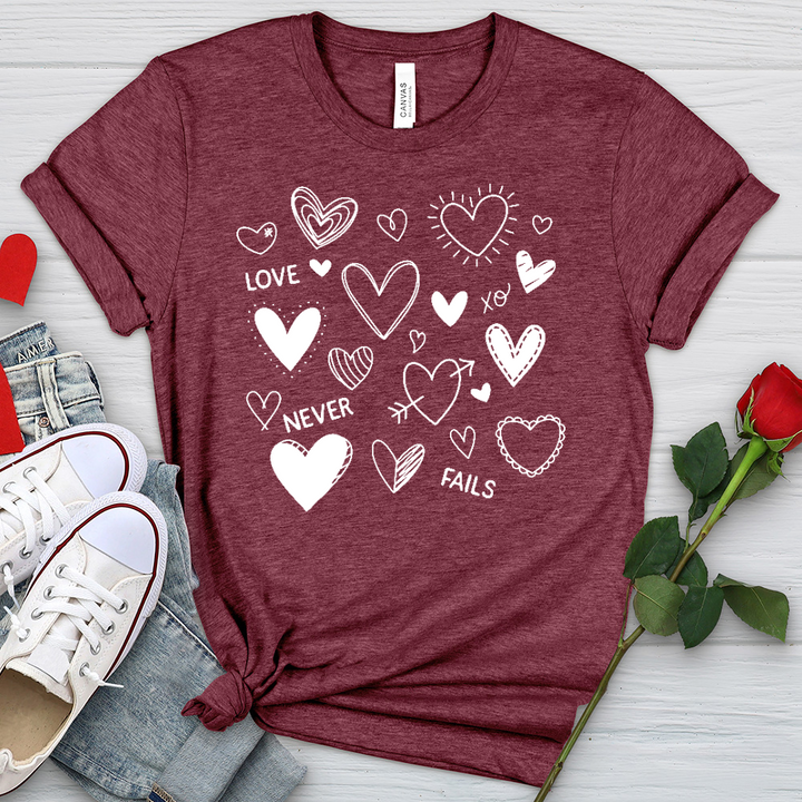 Love Never Fails Assorted Hearts Heathered Tee