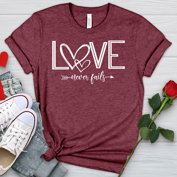 Love Never Fails Heart Arrow Heathered Tee