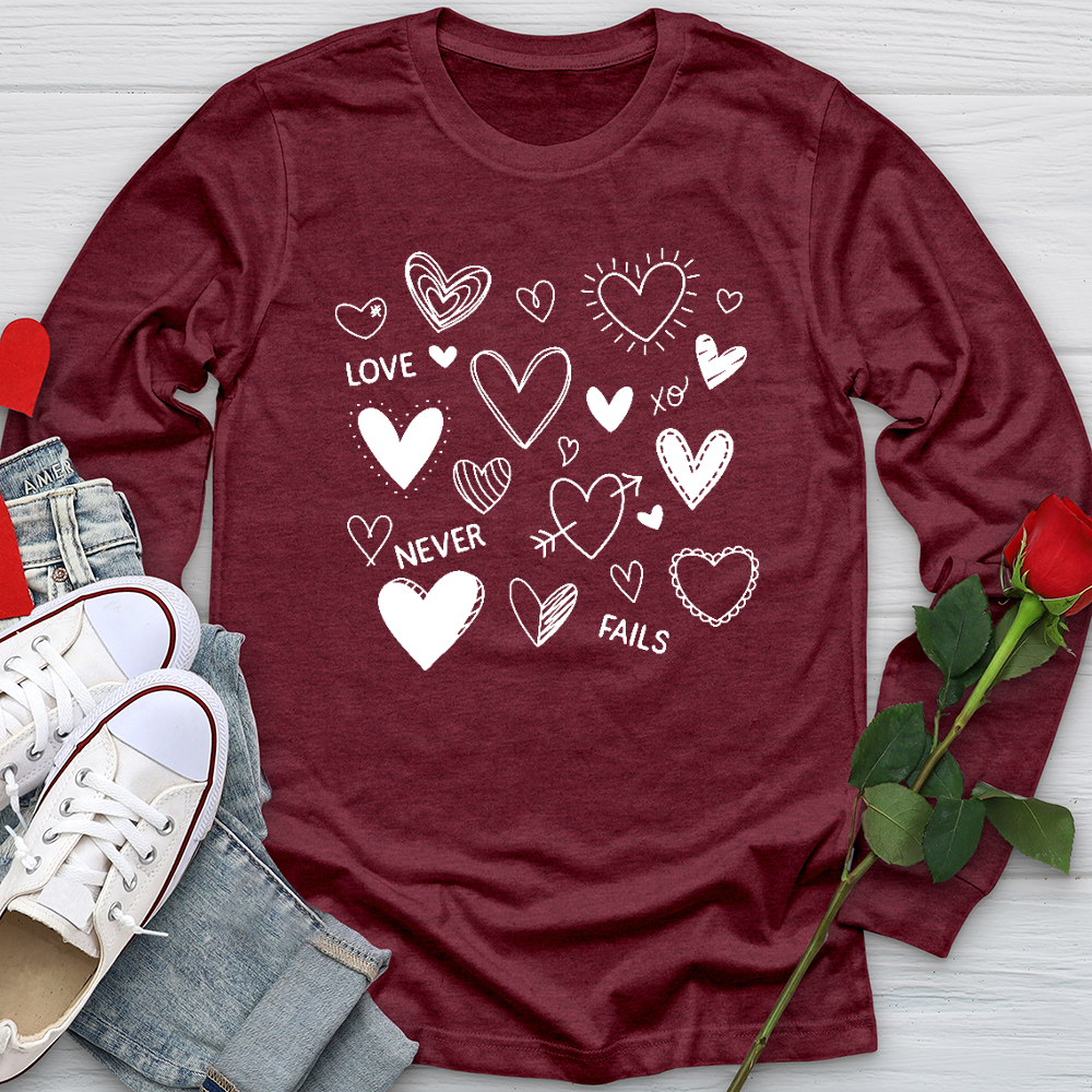 Love Never Fails Assorted Hearts Long Sleeve Tee