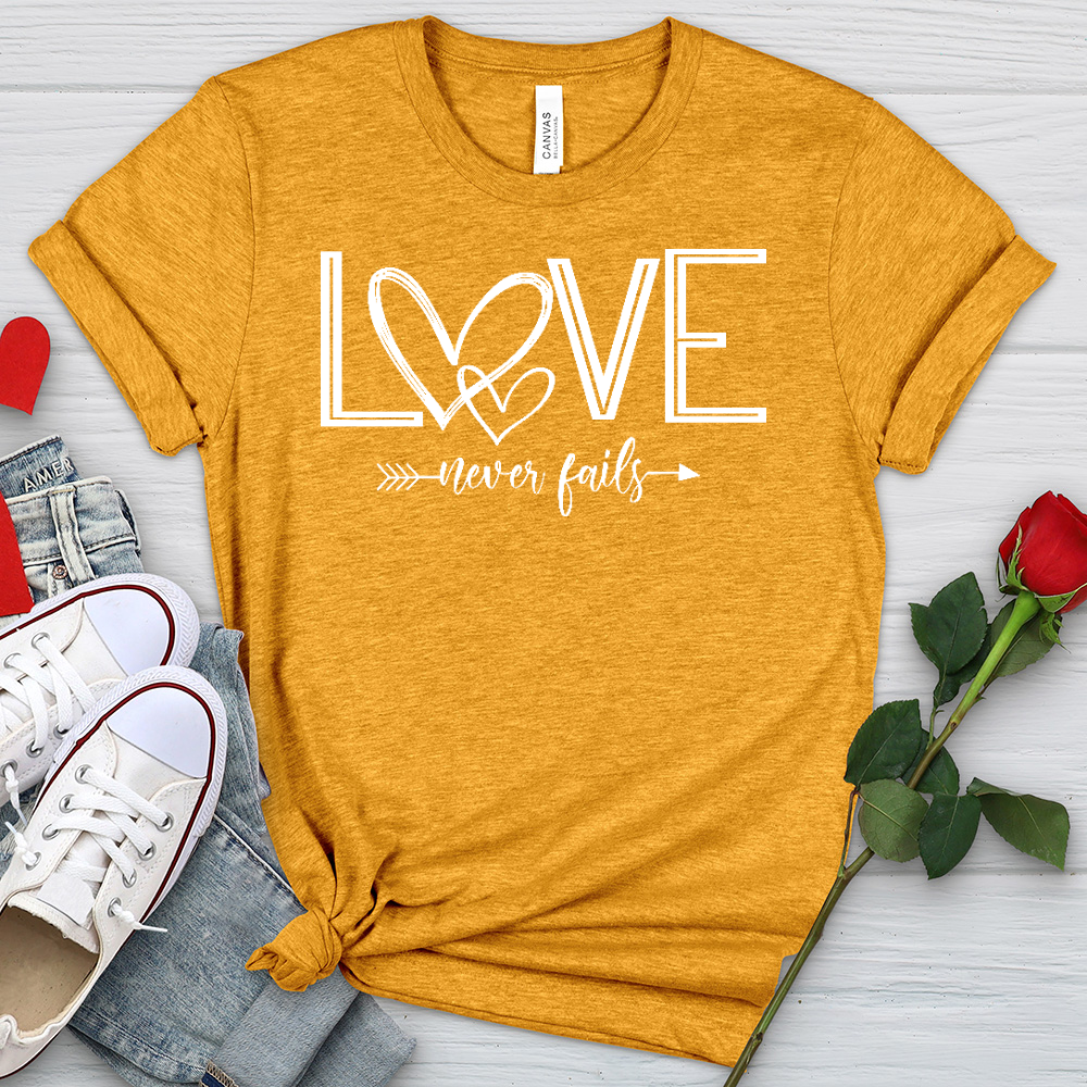 Love Never Fails Heart Arrow Heathered Tee