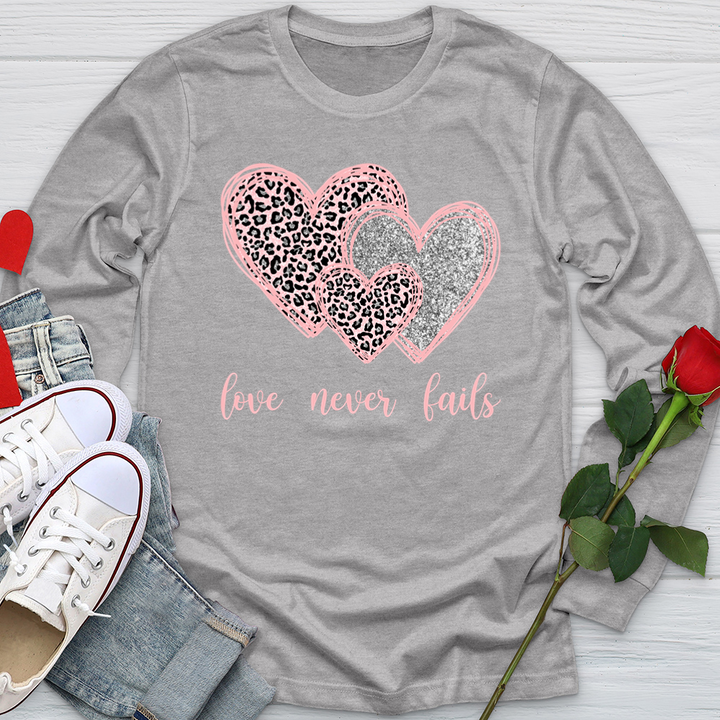 Love Never Fails Softstyle Long Sleeve