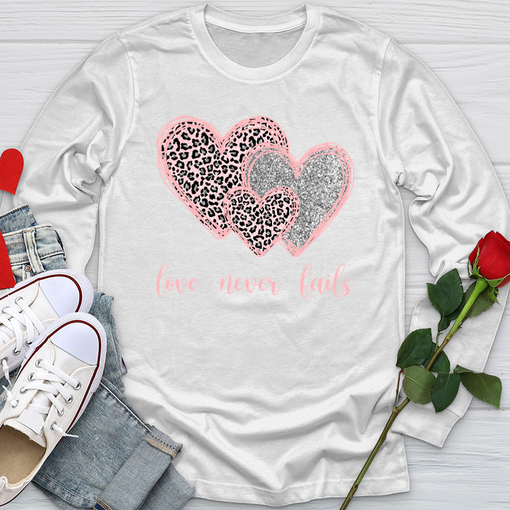 Love Never Fails Softstyle Long Sleeve